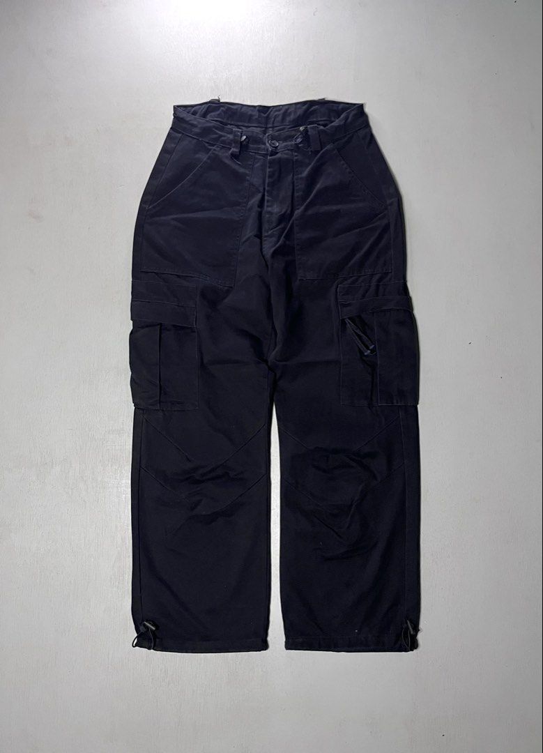 Black Tactical Cargo Pants with Drawstring Cuffs (Category: Joggers) located in Catbalogan. Submitted by yellfindss (Listing ID 1466750862, Image 1). Description: - Color: Solid black -30-32/39.5 l.o 8.5 - Pockets: Multiple deep pockets on front and sides - Details: Drawstring cords on side cargo pocket and adjustable hem toggles - Durability: Sturdy fabric with reinforced knee panels - Closure: Button fly with wide belt loops.