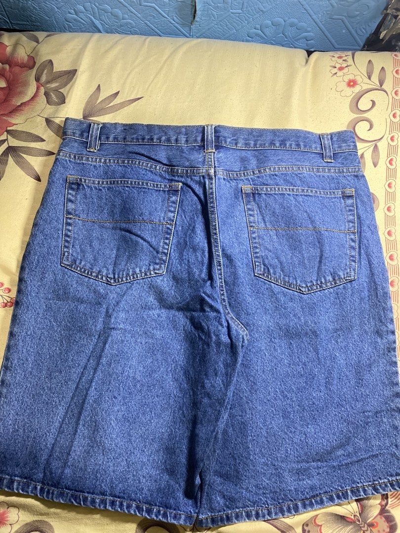 Blue Denim Shorts (Category: Shorts) located in Bacolor. Submitted by paw_thrift (Listing ID 1466690471, Image 3). Description: - Color: Medium blue - Design: Classic five-pocket style with contrast stitching - Fit: Roomy and comfortable for everyday casual wear - Features: Sturdy belt loops and secure metal button closure - Condition: Clean and solid construction.