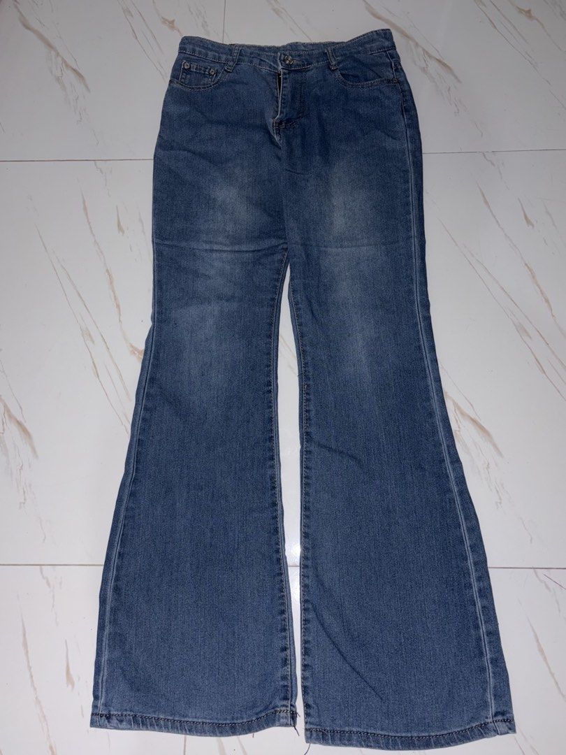 Blue flared denim jeans pants (Category: Jeans) located in Makati City. Submitted by sandra_ali (Listing ID 1466740933, Image 1). Description: Size 27 Flare Pants.