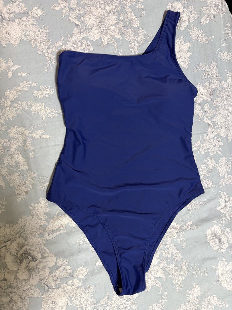 Blue One-Shoulder One-Piece Swimsuit (Category: Bikinis & Swimsuits) located in Muntinlupa City. Submitted by sungbora90 (Listing ID 1466713065, Image 1). Description: - Color: Solid Blue - Style: Chic one-shoulder, minimalist design - Fit: Smooth stretch fabric that hugs the body comfortably - Ideal for: Beach trips, pool days, and vacations - Condition: Brand new / Excellent.