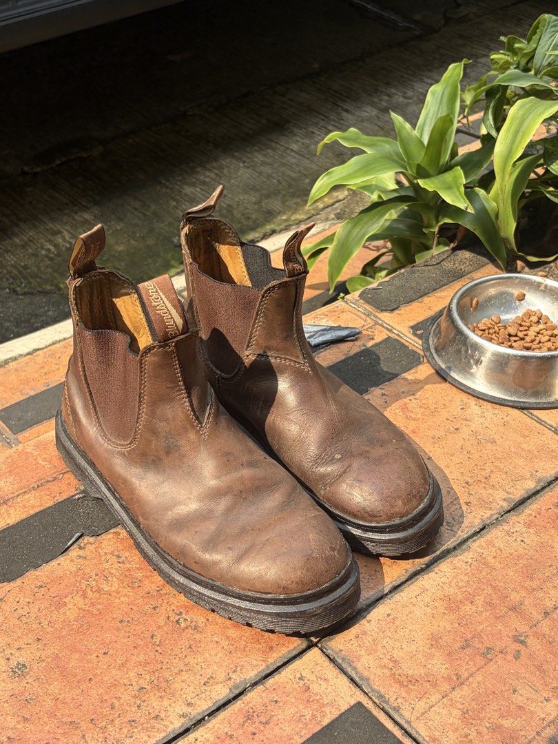 Blundstone Brown Chelsea Boots (Category: Boots) located in Quezon City. Submitted by nikoabl (Listing ID 1466567436, Image 1). Description: Blundstone Chelsea boots in brown leather. Elastic side gussets, pull tabs at front and back. Chunky lug soles with good grip. Dr. Scholl's insoles inside for extra comfort. Shows natural creasing, scuffs, and wear on the leather from regular use. Solid boots, ready for more wear. Worn good Changed outsoles 
