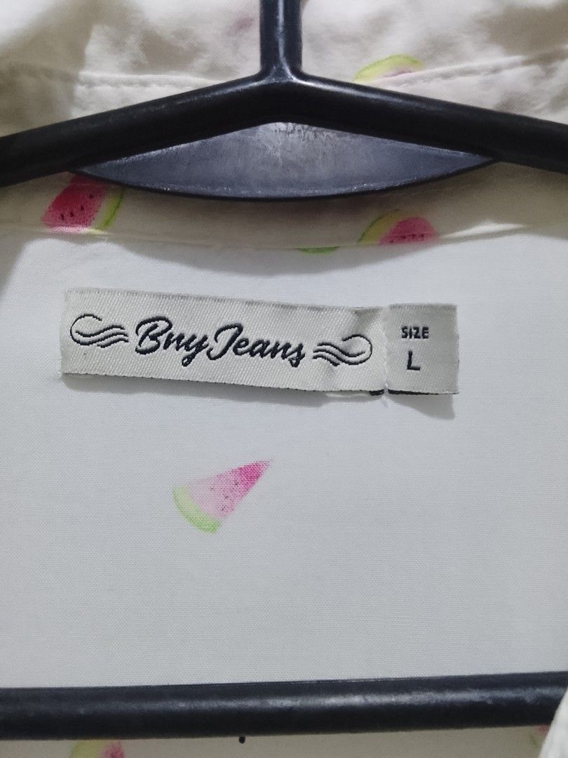 Bny Jeans button up shirt size L (Category: Blouses) located in Manila. Submitted by cabsclosetco (Listing ID 1466677124, Image 2). Description: - Brand: Bny Jeans - Size: Large but small sizing (more recommended for small to semi-medium girlies only) - Design: White button-up with cute watercolor watermelon slices - has tiny flaw (see last pic).