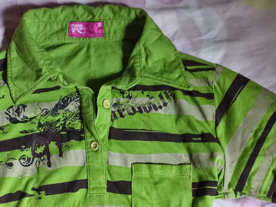 Boardwalk Green Striped Collared Polo Shirt (Category: Shirts) located in Pulilan. Submitted by hly_cllctn (Listing ID 1466744882, Image 2). Description: Boardwalk Green Striped Collared Polo Shirt Size: Xs to Small *EXTENSIVE PINHOLES Mine: 45 pesos (au).