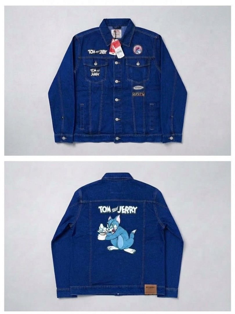 Bobson x Tom and Jerry Denim Jacket Size 2XL (Category: Coats, Jackets and Outerwear) located in Manila. Submitted by navias (Listing ID 1466638783, Image 1). Description: - Brand: Bobson - Condition: Brand new with original price tag attached, never worn - Size: 2XL - Color: Medium blue - Design: Tom and Jerry graphic print on the back, embroidery patches on the front chest and pockets - Closure: Button-up with metallic buttons.