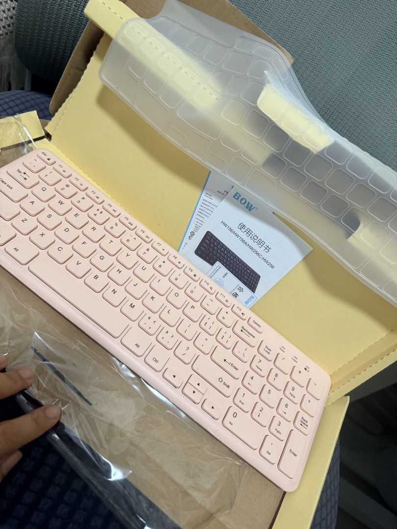 B.O.W HW156 Wireless Keyboard Pink (Category: Computer Keyboard) located in Marikina City. Submitted by ukayshopping (Listing ID 1466768155, Image 3). Description: - Model: B.O.W HW156 Series Wireless Keyboard - Color: Soft pink with a full number pad - Inclusion: Matching translucent silicone keyboard cover, user manual, and original yellow box - Condition: Clean layout, smooth keys, and ready to connect - Ideal for: Office setups, WFH, and onli