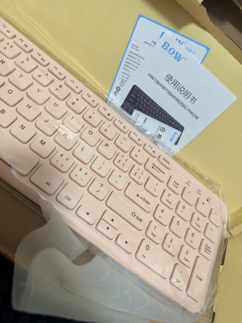 B.O.W HW156 Wireless Keyboard Pink (Category: Computer Keyboard) located in Marikina City. Submitted by ukayshopping (Listing ID 1466768155, Image 2). Description: - Model: B.O.W HW156 Series Wireless Keyboard - Color: Soft pink with a full number pad - Inclusion: Matching translucent silicone keyboard cover, user manual, and original yellow box - Condition: Clean layout, smooth keys, and ready to connect - Ideal for: Office setups, WFH, and onli