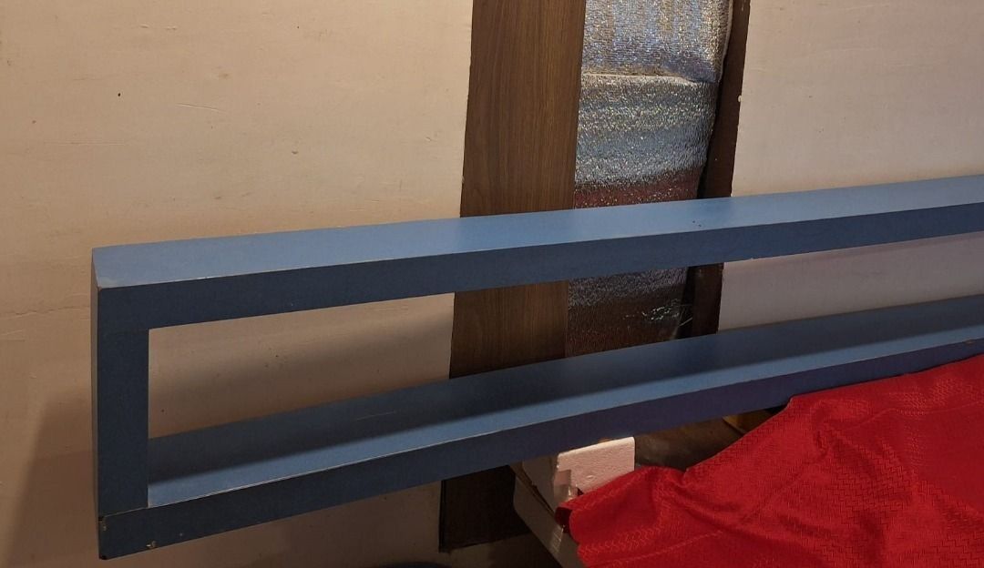 BOYS Room Shelf (Category: Shelves, Cabinets & Racks) located in General Trias. Submitted by aeunice (Listing ID 1466622413, Image 3). Description: Designed by POWERBOOKS in Alabang Town Center Brown L-108inch W-30inch Blue L-119inch W-29inch Color: Blue In Good Condition.Blue wooden floating shelf, rectangular with a hollow design. Sturdy and easy to mount, perfect for displaying books or decor in your living room or bedroom. Clean finish inside
