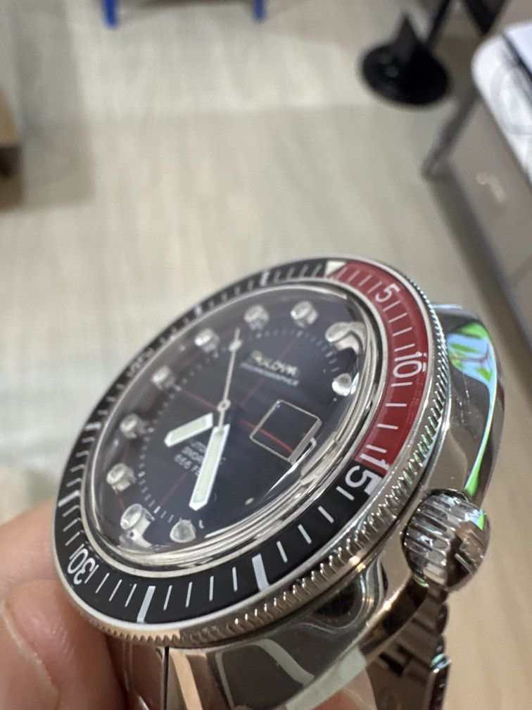 Bulova Oceanographer Devil Diver (Category: Men's Watches) located in Pasig City. Submitted by dtglee8 (Listing ID 1463212376, Image 3). Description: - Bulova Oceanographer "Pepsi" dive watch - Automatic movement - Water-resistant up to 666 feet - Rotating bezel with red and black markers - Date window at 3 o'clock - Stainless steel bracelet - Classic diver aesthetic.