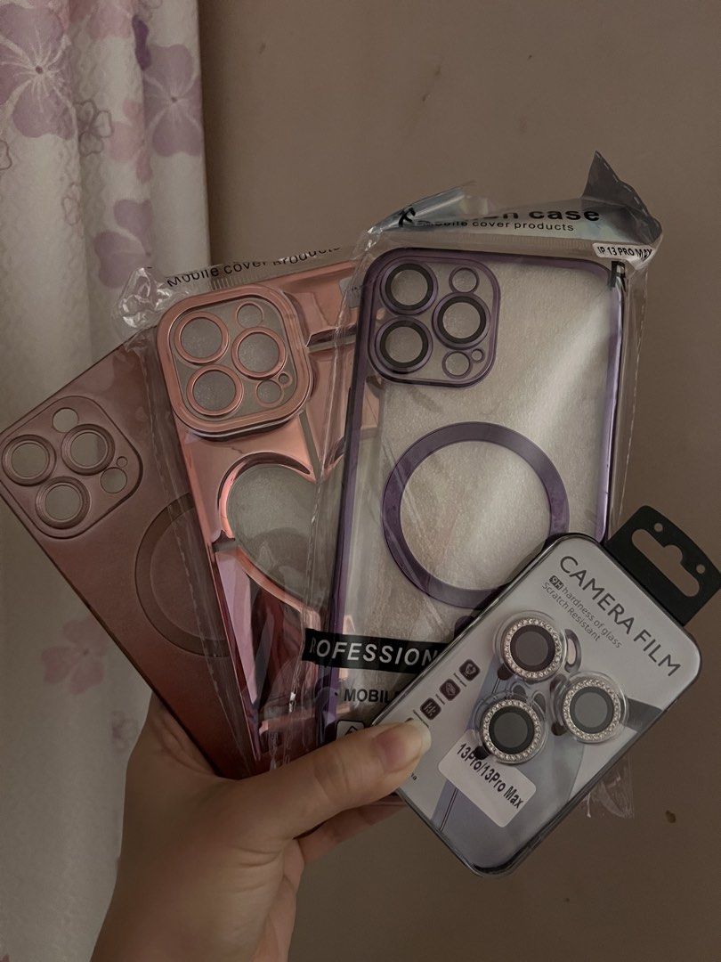 Bundle iPhone Pro Max Cases and Lens Cover (Category: Cases & Sleeves) located in Manila. Submitted by ot7purple (Listing ID 1466674431, Image 1). Description: - 2 Unused Cases, 1 Used Case and 1 Unused Lens Cover - Fits Pro Max ***Shipping fee not included. 📲IG: sofiajeneve.