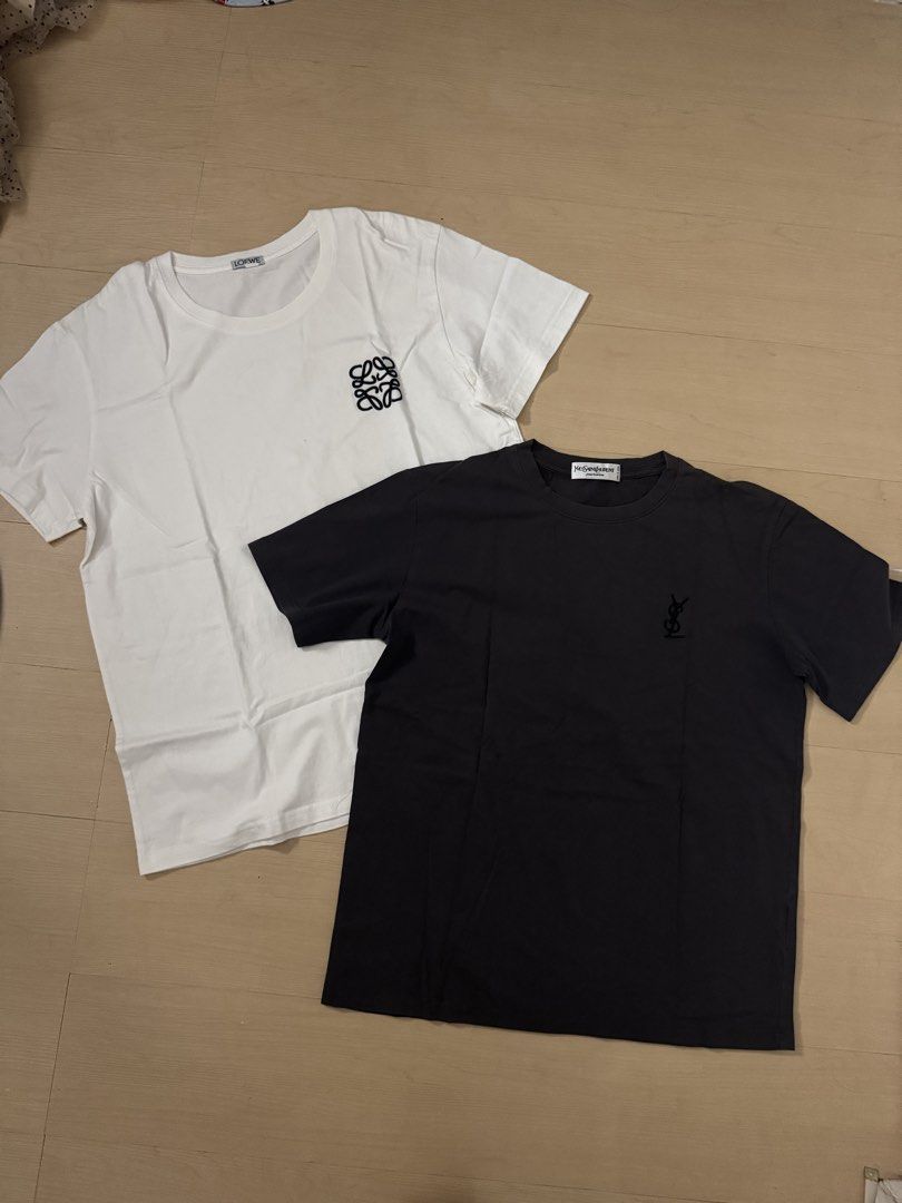Bundle YSl & Loewe tshirt (Category: Shirts) located in Manila. Submitted by juhjuh (Listing ID 1466676709, Image 1). Description: - Bundle of 2 luxury designer tees: White Loewe Anagram shirt & Black YSL Monogram shirt (Gray / White ) - Style: Short sleeve, classic crew neck - Condition: Clean, crisp fabric, great for daily wear - Perfect everyday staples to elevate your casual fit - Selling as a set / Grab both together - PM for measurements an