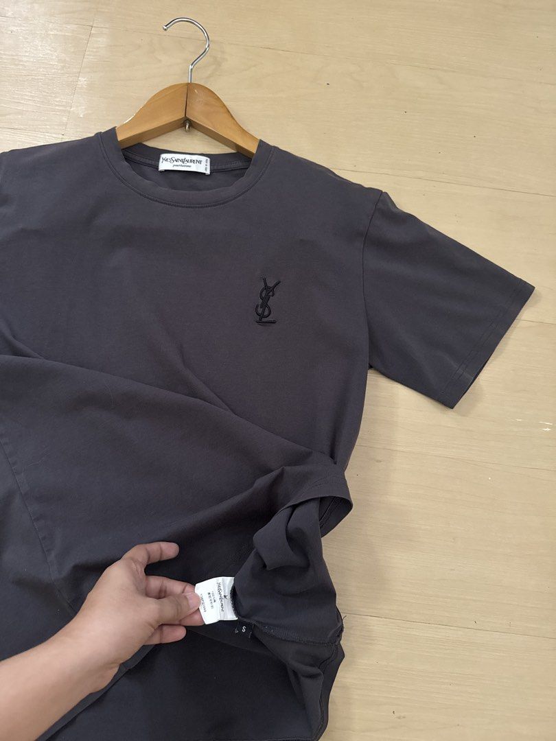 Bundle YSl & Loewe tshirt (Category: Shirts) located in Manila. Submitted by juhjuh (Listing ID 1466676709, Image 3). Description: - Bundle of 2 luxury designer tees: White Loewe Anagram shirt & Black YSL Monogram shirt (Gray / White ) - Style: Short sleeve, classic crew neck - Condition: Clean, crisp fabric, great for daily wear - Perfect everyday staples to elevate your casual fit - Selling as a set / Grab both together - PM for measurements an