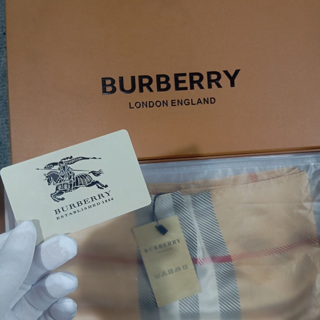 Burberry Check Knight Stamp Silk Scarf (Category: Luxury Accessories) located in Taguig. Submitted by sito. (Listing ID 1466633596, Image 3). Description: For sale! 📣 Burberry Check Knight Stamp Silk Scarf Specs and measurements: • Dimension: 200cm x 70cm Condition Details: • Issue: None • Original Packaging • Color rate: 10/10 • Overall Condition: 10/10 Asking Price: ~₱2800 Transaction Details: Location: Upper Bicutan, Taguig City, Metro Manila