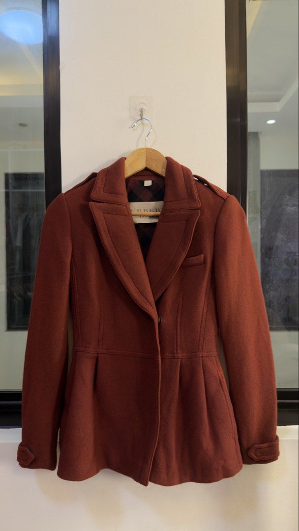 Burberry Wool Blend Peplum Coat (Category: Coats, Jackets and Outerwear) located in Paranaque City. Submitted by preluxeshop_ph (Listing ID 1466768308, Image 2). Description: Burberry Wool Blend Peplum Coat -Flattering peplum silhouette -Classic Burberry inner check lining -A stylish statement piece for any wardrobe! -Condition: 9.8/10 -Dimes: Length: 25.5” Width: 16”.