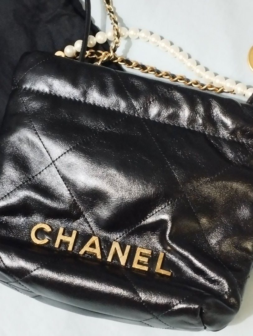 C22 mini calfskin (Category: Luxury Bags & Wallets) located in Rizal. Submitted by shoppin_craze (Listing ID 1466703121, Image 2). Description: CC22 mini calfskin leather. gold hardware chains excelkent condition, comes with dustbag. i can provide box as well free shipping via j&t.