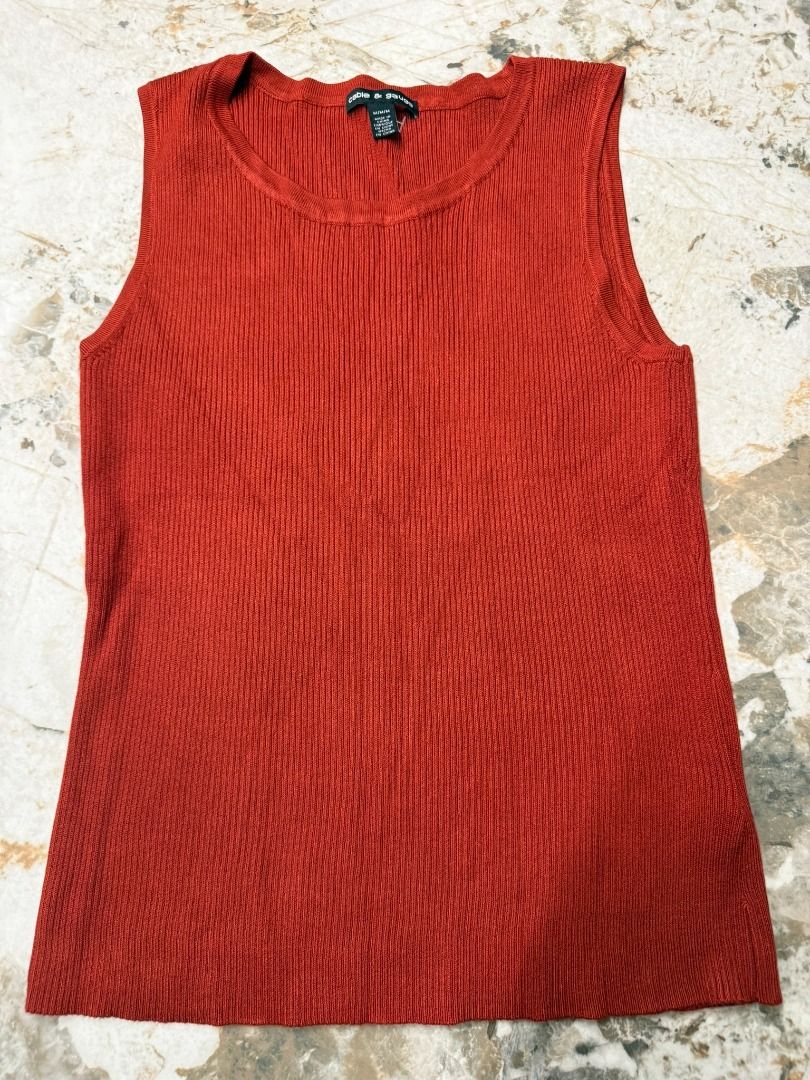 CABLE & GAUGE FINE RIBBED KNIT TANK TOP (Category: Others Tops) located in Makati City. Submitted by fpled (Listing ID 1466734180, Image 1). Description: ✨ TERRACOTTA FINE RIBBED KNIT TANK TOP ✨ (Uniqlo / Zara Style • Workwear Inner / Capsule Wardrobe) An ultra-soft, fine-ribbed knit sweater tank in a rich warm rust / terracotta tone. Crafted from a stretchy, breathable knit that hugs comfortably—the ultimate versatile base piece for blazers, off