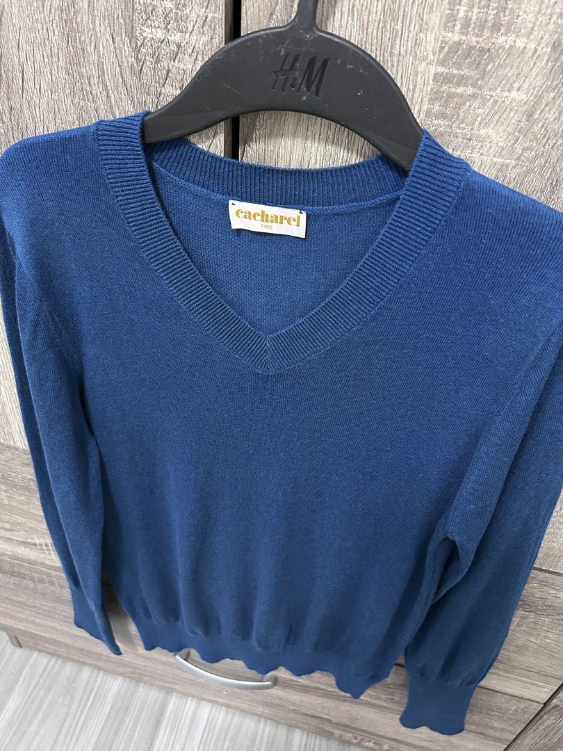 Cacharel Paris Blue V-Neck Knit Sweater (Category: Longsleeves) located in Cainta. Submitted by mimidiva (Listing ID 1466707737, Image 3). Description: Cacharel V-Neck Fine Cotton Knitted Sweater Size: Can fit Medium to Semi Large Color: Aqua Blue Material: Fine cotton Made in Kore p380 LIKE NEW! Cainta Location.