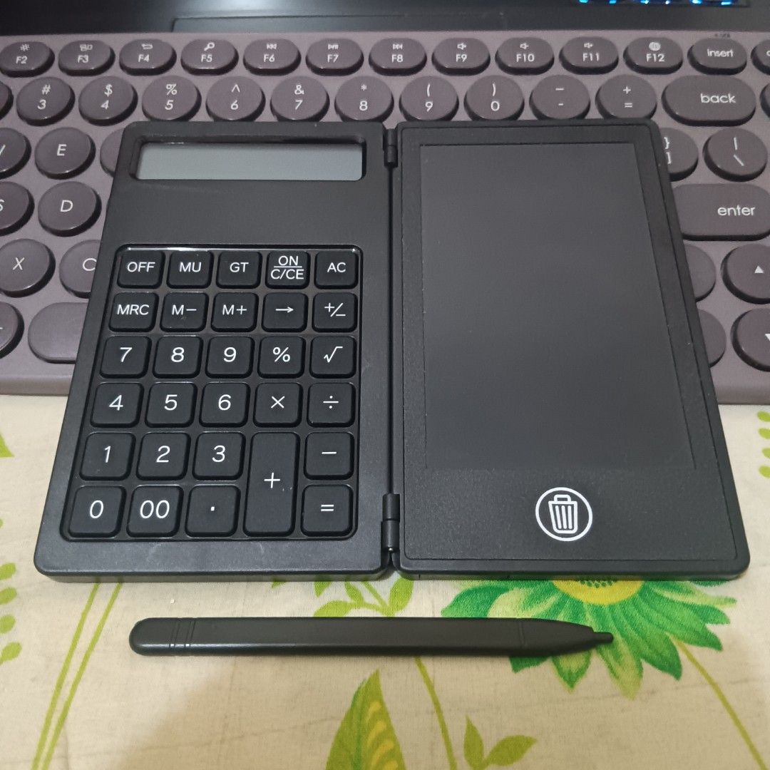 Calculator with Writing Pad (Category: Other Gadgets) located in Muntinlupa City. Submitted by amaureluna (Listing ID 1466678880, Image 3). Description: Just needs a battery change to erase for the writing pad. (Unsure what type of battery) Stylus feels smooth on the pad LCD and all keys are functional Front and back plates have some scratches (but it adds character (⁠｡⁠•̀⁠ᴗ⁠-⁠)⁠✧).
