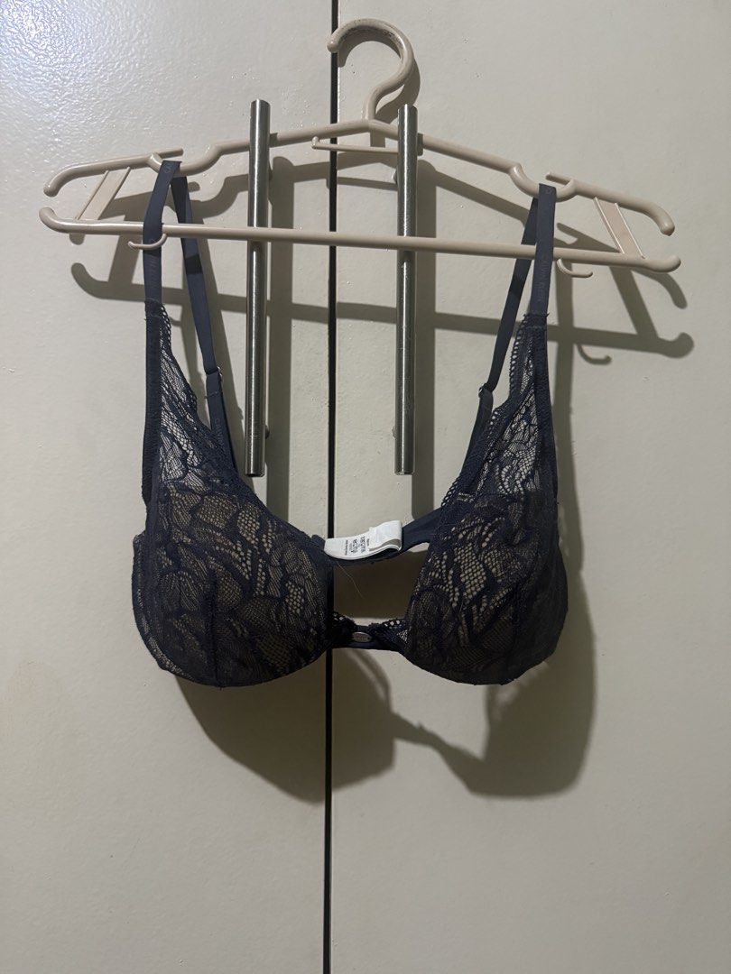 Calvin Klein Dark Blue Lace Bra (Category: Undergarments & Loungewear) located in Marikina City. Submitted by moonchok (Listing ID 1466719537, Image 1). Description: Brand: Calvin Klein Color: Dark navy blue Intricate floral lace over molded cups Straps: Adjustable with printed Calvin Kleinbrand logo Hardware: Branded metal detail between cups - Material: Soft, stretchy, and comfortable for daily wear - Condition: like new / Excellent - Mode of P