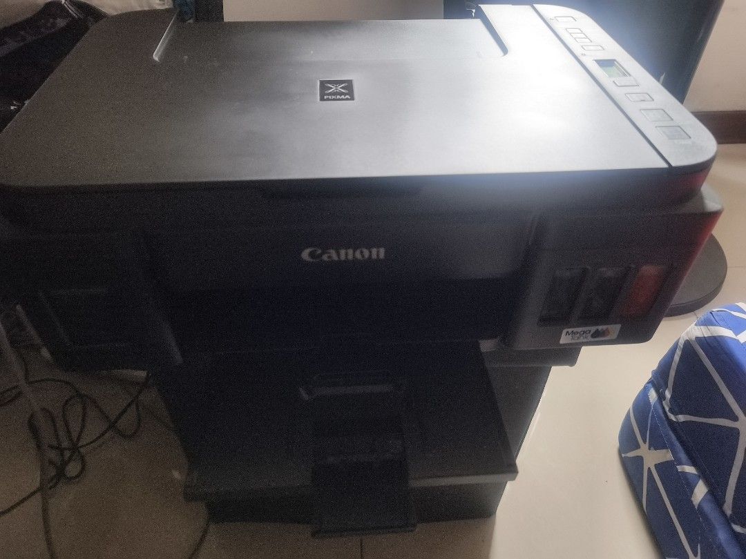 Canon PIXMA G3010 Wireless All-In-One Printer (Category: Printers, Scanners & Copiers) located in Quezon City. Submitted by zeneagle.0d92b4 (Listing ID 1466608776, Image 1). Description: - Model: Canon PIXMA G3010 Wireless All-in-One Printer - Functions: Print, scan, and copy - Ink System: Refillable ink tanks with front-facing visibility windows for easy level monitoring - Connectivity: Built-in Wi-Fi for wireless network and direct mobile print