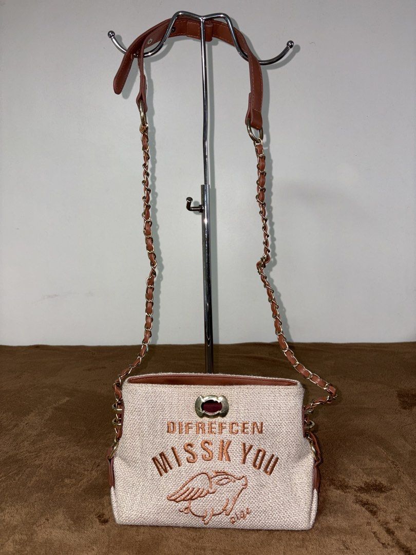 Canvas Shoulder Bag with Embroidery Chain Strap (Category: Shoulder Bags) located in Baguio. Submitted by maje_mori (Listing ID 1466704463, Image 1). Description: - Condition: Excellent, clean inside and out with almost no signs of use (check photos for reference).