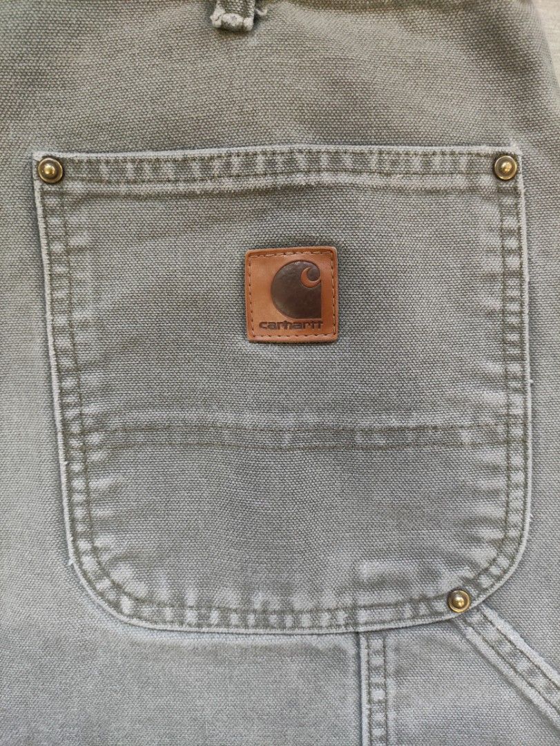 Carhartt B136 MOS Double Knee Carpenter Pants (Category: Jeans) located in Calamba. Submitted by alorbis96758 (Listing ID 1466567646, Image 3). Description: ▪️Dimensions Length : 44 Waist : 34~35 Hem : 9 ▪️Original Dungaree Fit ▪️Zippers Working Condition : Excellent ▪️Complete Tags ✅ ▪️Overall Condition : Used - Workwear ▪️Issues : Distress, Minimal Stain, Fadings, Ripped.