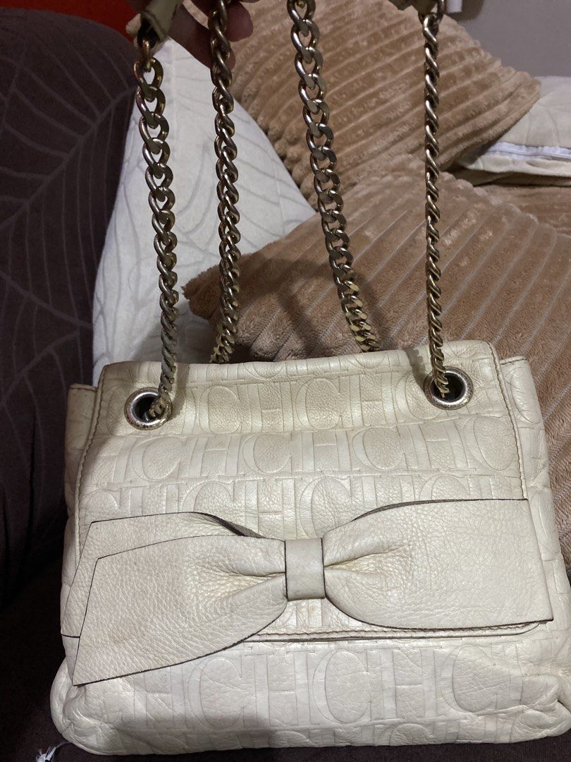 Carolina Herrera Monogram Audrey Bag (Category: Shoulder Bags) located in Quezon City. Submitted by jamie_87 (Listing ID 1466746158, Image 1). Description: Rank C-D (Needs bag spa, repaint, and hardware polishing) Price is still negotiable (PM me now!) Pros: overall bag’s leather condition outside is excellent, interior still clean, no holes and powdery residue Cons: hardwares need polishing, bag spa to rid off the vintage storage smell, and repa