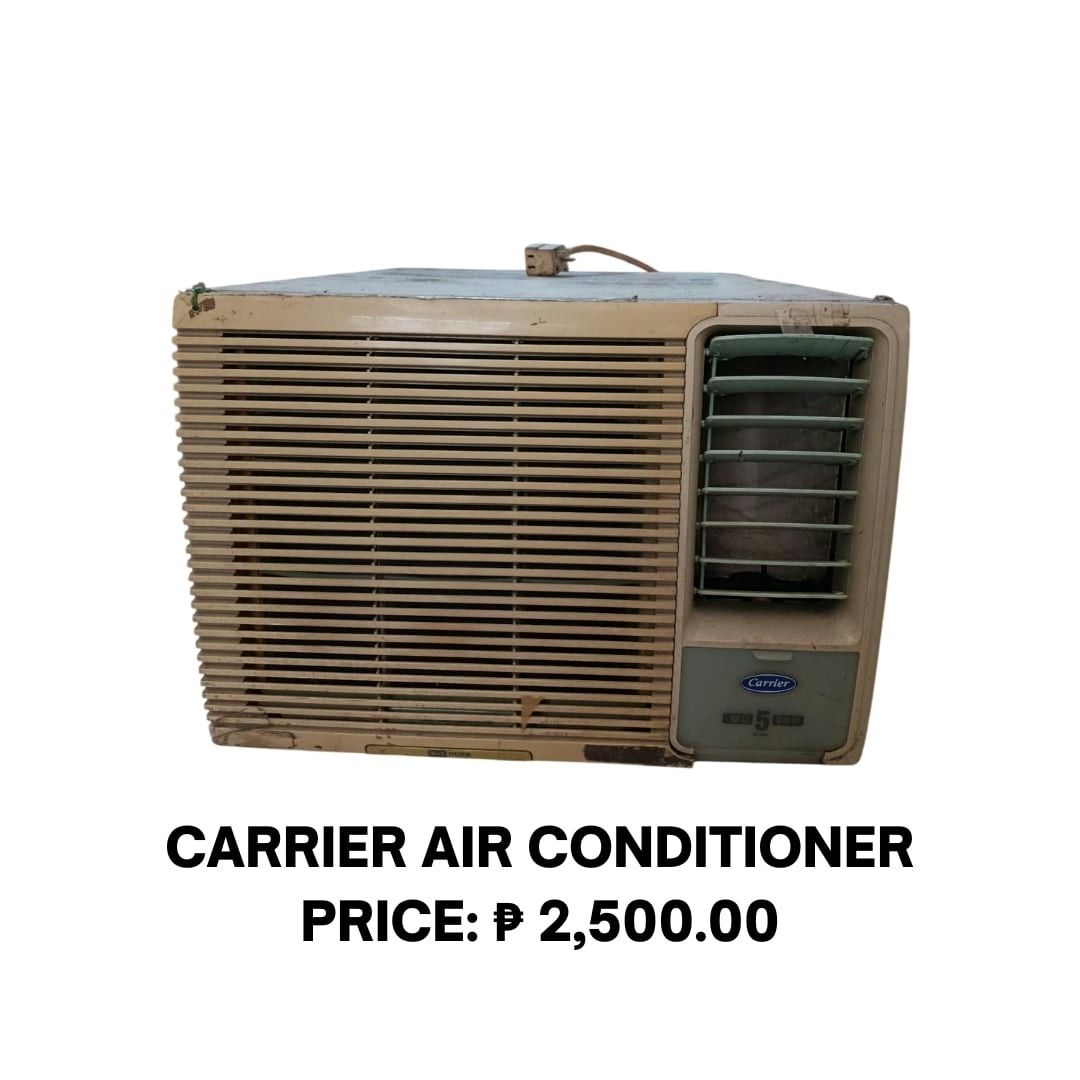 Carrier Window Type Air Conditioner (Category: Air Conditioning and Heating) located in Manila. Submitted by jjwebshop2026 (Listing ID 1466569540, Image 1). Description: - Brand: Carrier window-type air conditioner - Design: Beige front grill with adjustable green louvers and mechanical dial controls - Condition: Heavy usage marks, scuffs, and discoloration; needs cleaning and servicing, it is a little bit noisy. - Features: Standard mechanical d