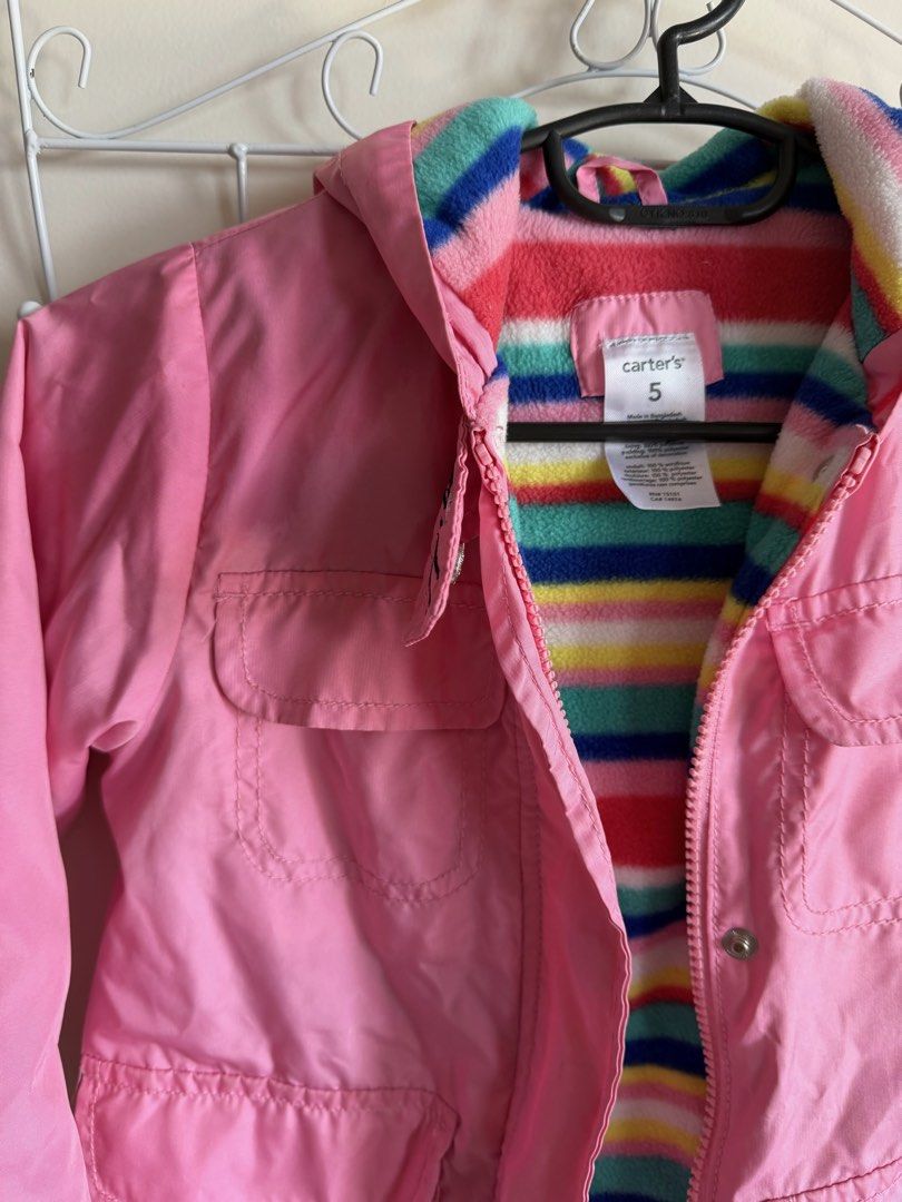 Carter's Pink Rainbow Stripe Fleece Lined Jacket Size 5 (Category: Babies & Kids Fashion) located in Quezon City. Submitted by bubspreloved (Listing ID 1466770901, Image 2). Description: - Brand: Carter's - Size: 5 - Color/Design: Pink with vibrant rainbow striped we fleece lining and hood - Features: Front pockets, zipper closure with snap buttons, and rainbow patch on left sleeve - Perfect for keeping your child warm and stylish!.
