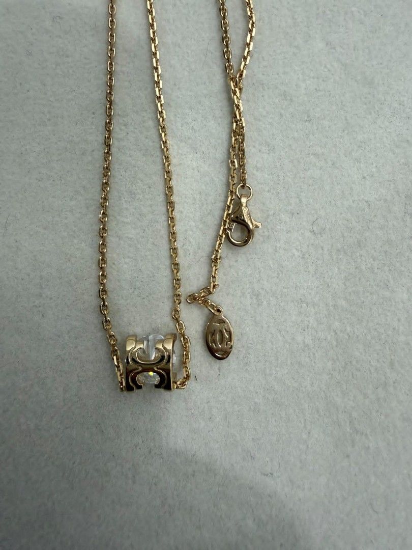 Cartier Necklace (Category: Necklaces) located in Manila. Submitted by yonasaints46584 (Listing ID 1466584250, Image 3). Description: - S925 Gold Plated c de cartier necklace - moissanite stone - Delicate link chain complete with the iconic Cartier logo tag near the lobster clasp - Perfect luxury gift or timeless addition to your everyday fine jewelry collection.