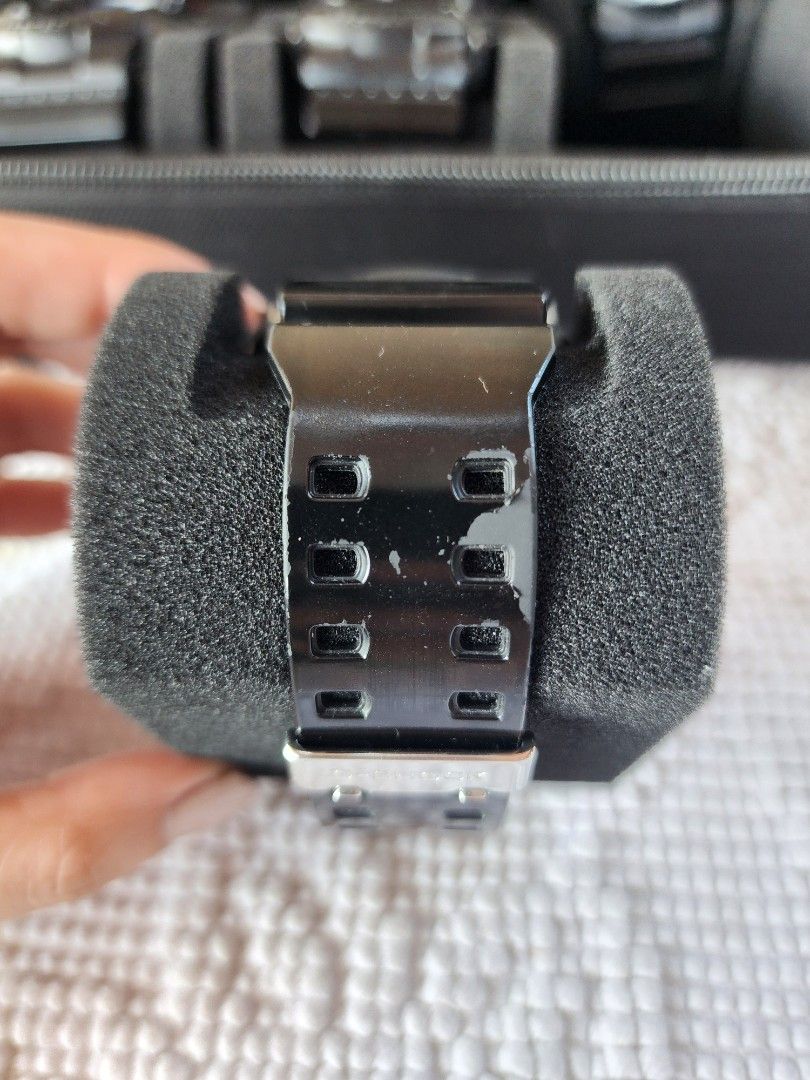 Gshock (Category: Men's Watches) located in Imus. Submitted by alecsssss (Listing ID 1466569589, Image 3). Description: - Strap: Black resin strap with stainless steel buckle - Condition: Noticeable paint peeling and wear on the strap keepers from previous use, fully functional - Special Features: Nigel Sylvester signature engraved on the back case - Bought in Japan - NO BOX - Personal collection. Decluttering.