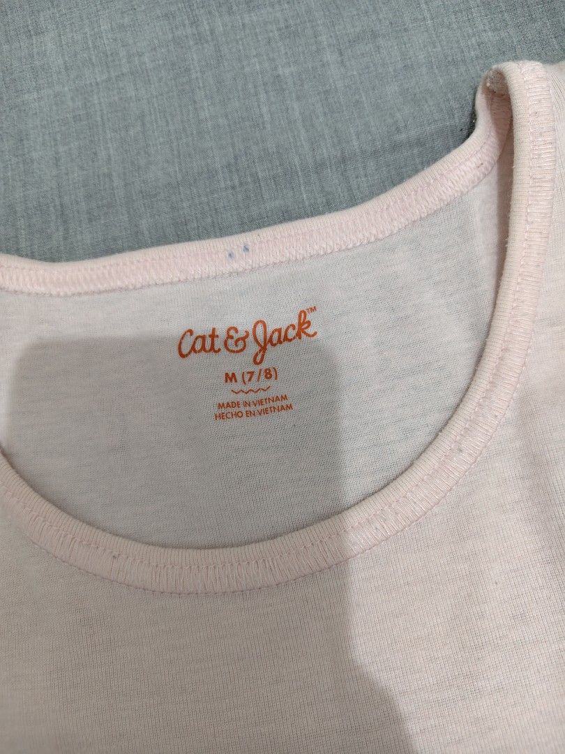 Cat & Jack Pink Tank Top Size M 7/8 (Category: Babies & Kids Fashion) located in Mandaluyong City. Submitted by declutterpreloved2.0 (Listing ID 1466770195, Image 2). Description: - Brand: Cat & Jack - Color: Light Pink - Size: M (Fits ages 7 to 8 years) - Material: Soft and breathable cotton - Features: Classic sleeveless cut with ribbed neckline trim - Origin: Made in Vietnam - Condition: Great for everyday layering and casual wear.