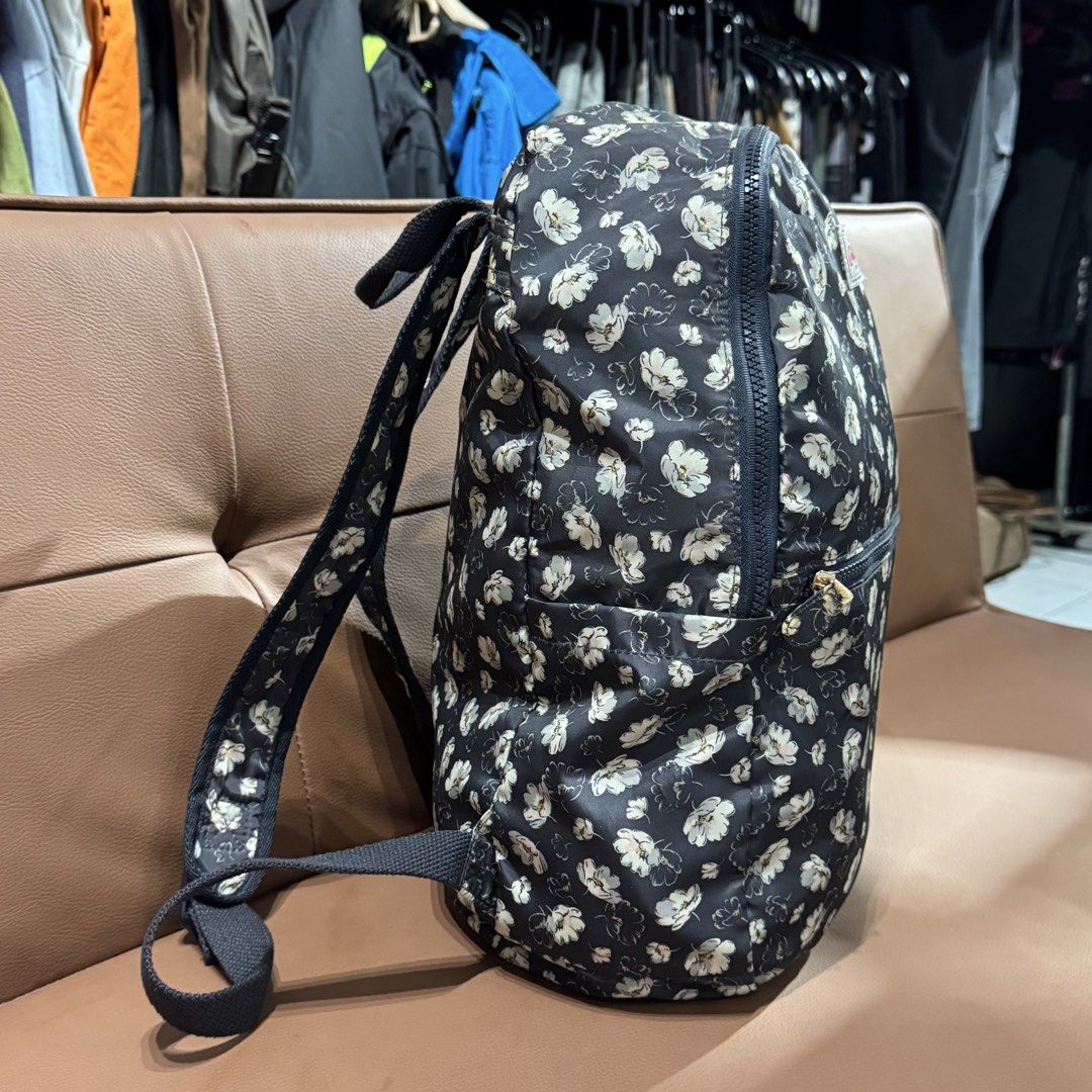 Cath Kidston Black Floral Backpack (Category: Backpacks) located in Rizal. Submitted by houseofbell (Listing ID 1466729059, Image 3). Description: - Authentic Cath Kidston backpack in classic black with an all-over white floral pattern - Front zippered pocket for quick access to essentials - Spacious main compartment with a separate interior button pocket - Dual adjustable shoulder straps for a comfortable fit - Clean interior lining with officia