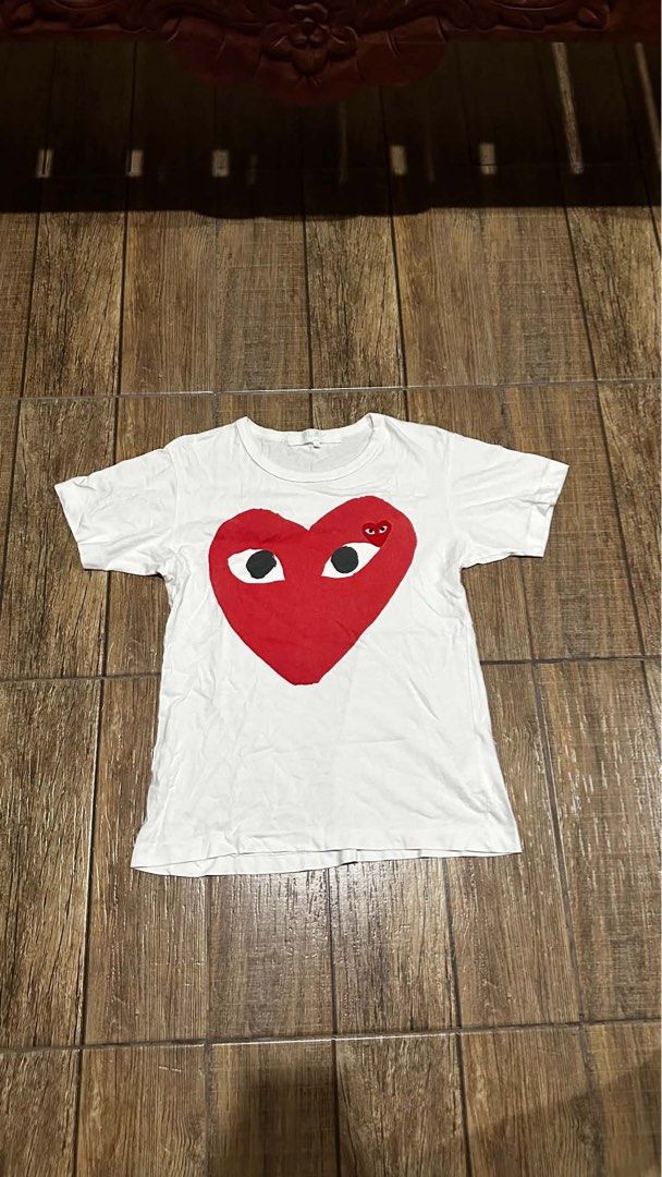CDG PLAY (Category: Tshirts & Polo Shirts ) located in Manila. Submitted by urban.vintage (Listing ID 1466746095, Image 1). Description: ISSUE: NONE (NEED WASH) MOP :GCASH (NO COD) SHIP VIA: LALAMOVE & J&T LOCATION: PASIG CITY LENGTH: 22 WIDTH :17.
