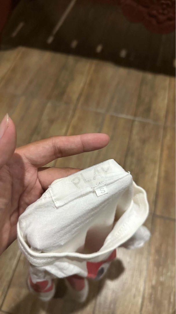 CDG PLAY (Category: Tshirts & Polo Shirts ) located in Manila. Submitted by urban.vintage (Listing ID 1466746095, Image 3). Description: ISSUE: NONE (NEED WASH) MOP :GCASH (NO COD) SHIP VIA: LALAMOVE & J&T LOCATION: PASIG CITY LENGTH: 22 WIDTH :17.