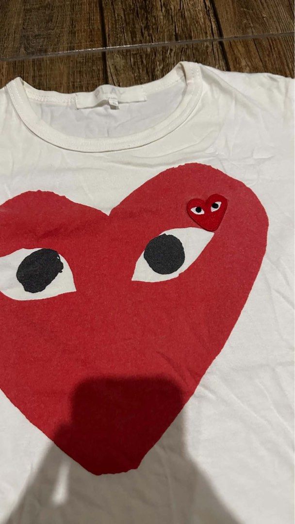 CDG PLAY (Category: Tshirts & Polo Shirts ) located in Manila. Submitted by urban.vintage (Listing ID 1466746095, Image 2). Description: ISSUE: NONE (NEED WASH) MOP :GCASH (NO COD) SHIP VIA: LALAMOVE & J&T LOCATION: PASIG CITY LENGTH: 22 WIDTH :17.