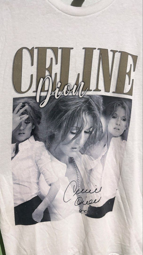 Celine Dion Vintage Graphic Tee (Category: Shirts) located in Baguio. Submitted by iconicsmeti (Listing ID 1466613540, Image 3). Description: - Brand/Tag: Gildan Heavy Cotton - Size: Small - Design: Celine Dion portrait print with signature and bold retro lettering - Style: Classic crewneck, short sleeves - Condition: Clean, from a smoke-free home.