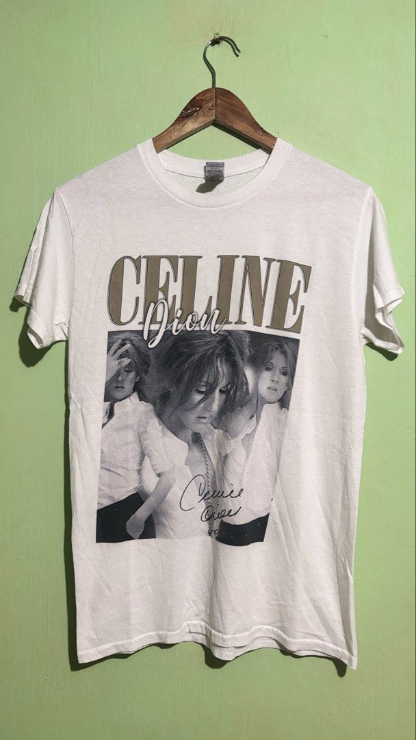 Celine Dion Vintage Graphic Tee (Category: Shirts) located in Baguio. Submitted by iconicsmeti (Listing ID 1466613540, Image 1). Description: - Brand/Tag: Gildan Heavy Cotton - Size: Small - Design: Celine Dion portrait print with signature and bold retro lettering - Style: Classic crewneck, short sleeves - Condition: Clean, from a smoke-free home.