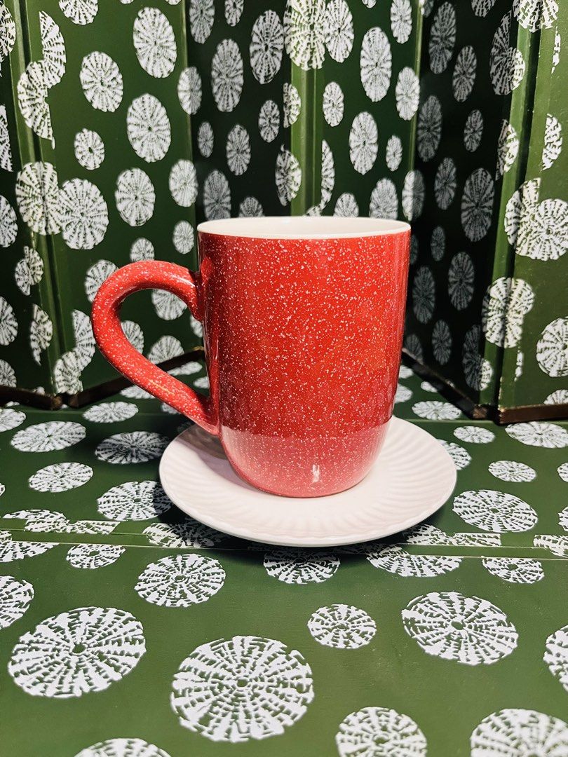 Century Red Speckled Coffee Mug With Saucer (Category: Coffee & Tea Tableware) located in Malabon City. Submitted by mgsurplus (Listing ID 1466565166, Image 1). Description: - Brand: Century by S.I.C. - Set includes: Red speckled coffee mug and matching white saucer - Material: Solid ceramic with a nice, sturdy weight - Design: Classic shape with a comfortable handle - Perfect for: Morning coffee, tea, or hot chocolate.