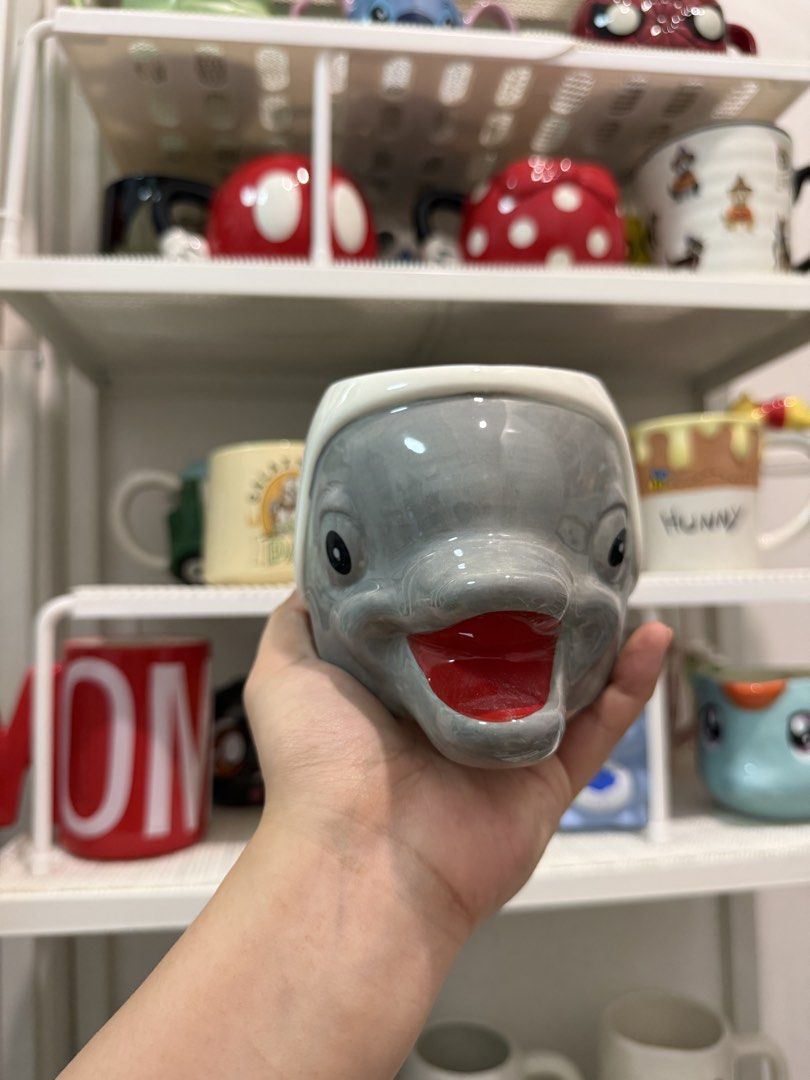 Ceramic Dolphin Mug (Category: Coffee & Tea Tableware) located in Quezon City. Submitted by fragilebabies (Listing ID 1466677702, Image 1). Description: Disclaimer: Please be reminded that these mugs are mall pull-out items. Minor imperfections such as small chips, slight paint chips, crazing (fine hairlines), and other minor marks may be present and are considered normal for mall pull-out items. That said, most of our mugs are still in good cond