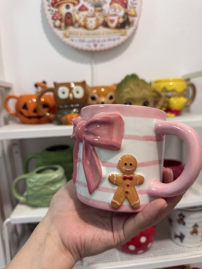 Ceramic Pink Ribbon Gingerbread Mug (Category: Coffee & Tea Tableware) located in Quezon City. Submitted by fragilebabies (Listing ID 1466672951, Image 2). Description: Disclaimer: Please be reminded that these mugs are mall pull-out items. Minor imperfections such as small chips, slight paint chips, crazing (fine hairlines), and other minor marks may be present and are considered normal for mall pull-out items. That said, most of our mugs are st