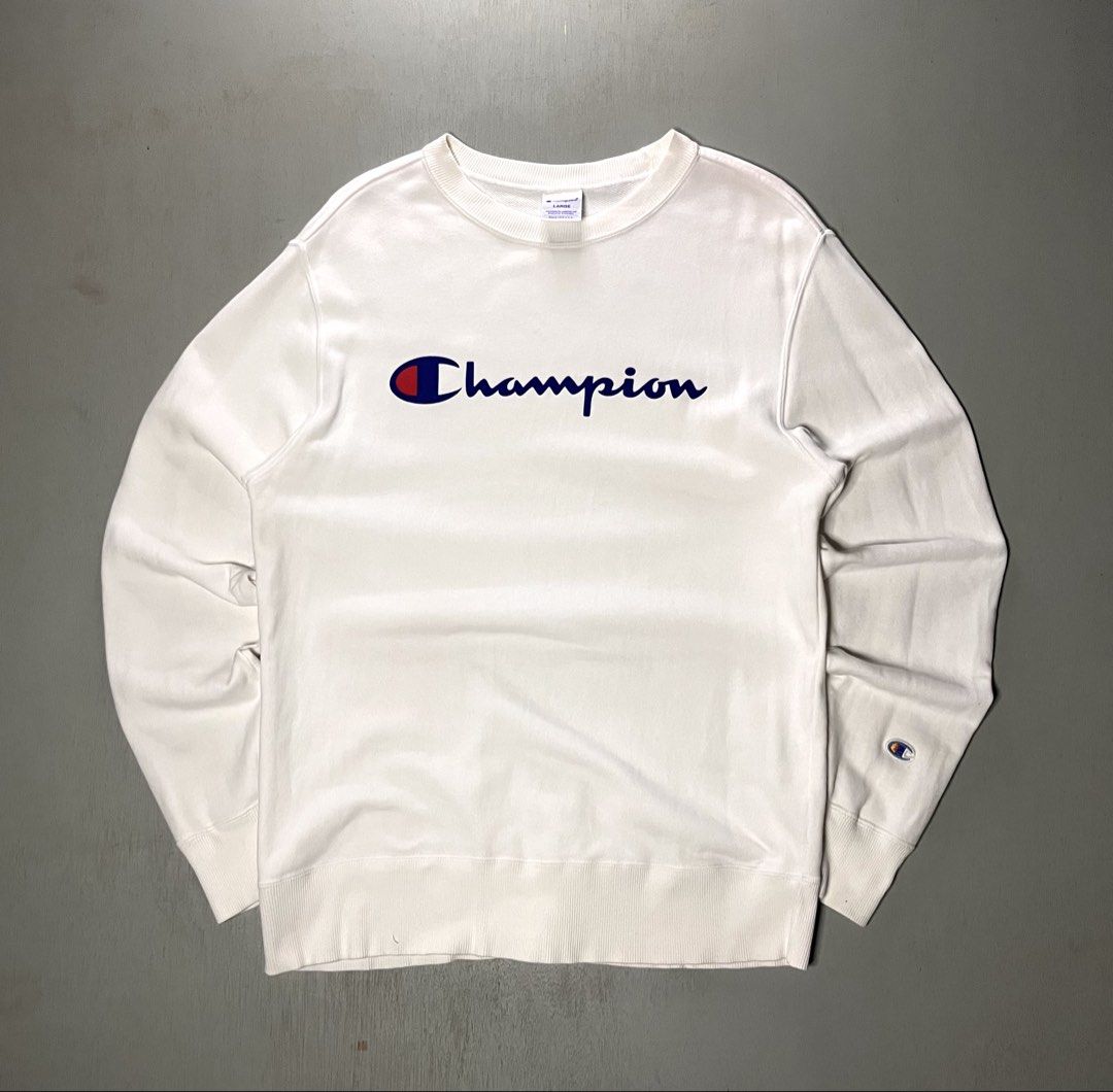 Champion White Script Logo Sweatshirt Size Large (Category: Coats, Jackets and Outerwear) located in Catbalogan. Submitted by yellfindss (Listing ID 1466741719, Image 1). Description: - Brand: Champion 20/27 - Style: Classic crewneck sweatshirt with script logo - Size: Large - Color: White - Condition: Clean fabric with comfy fleece interior - Details: Ribbed cuffs and hem, iconic embroidered sleeve patch - Perfect for: Cool weather layering.