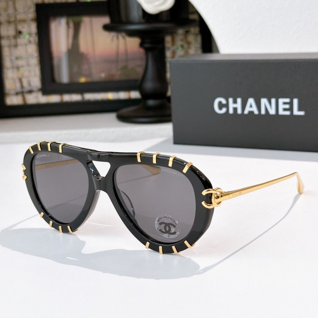 Chanel Aviator Sunglasses with Box (Category: Sunglasses & Eyewear) located in Paranaque City. Submitted by nurishadyl22738 (Listing ID 1466645485, Image 1). Description: - Brand: Chanel - Style: Classic aviator / pilot shape - Details: Metal accents around frames, signature CC logo on temples - Lenses: Tinted for sun protection - Inclusions: Branded black storage box - Condition: Great statement eyewear for daily outfits and sunny days.