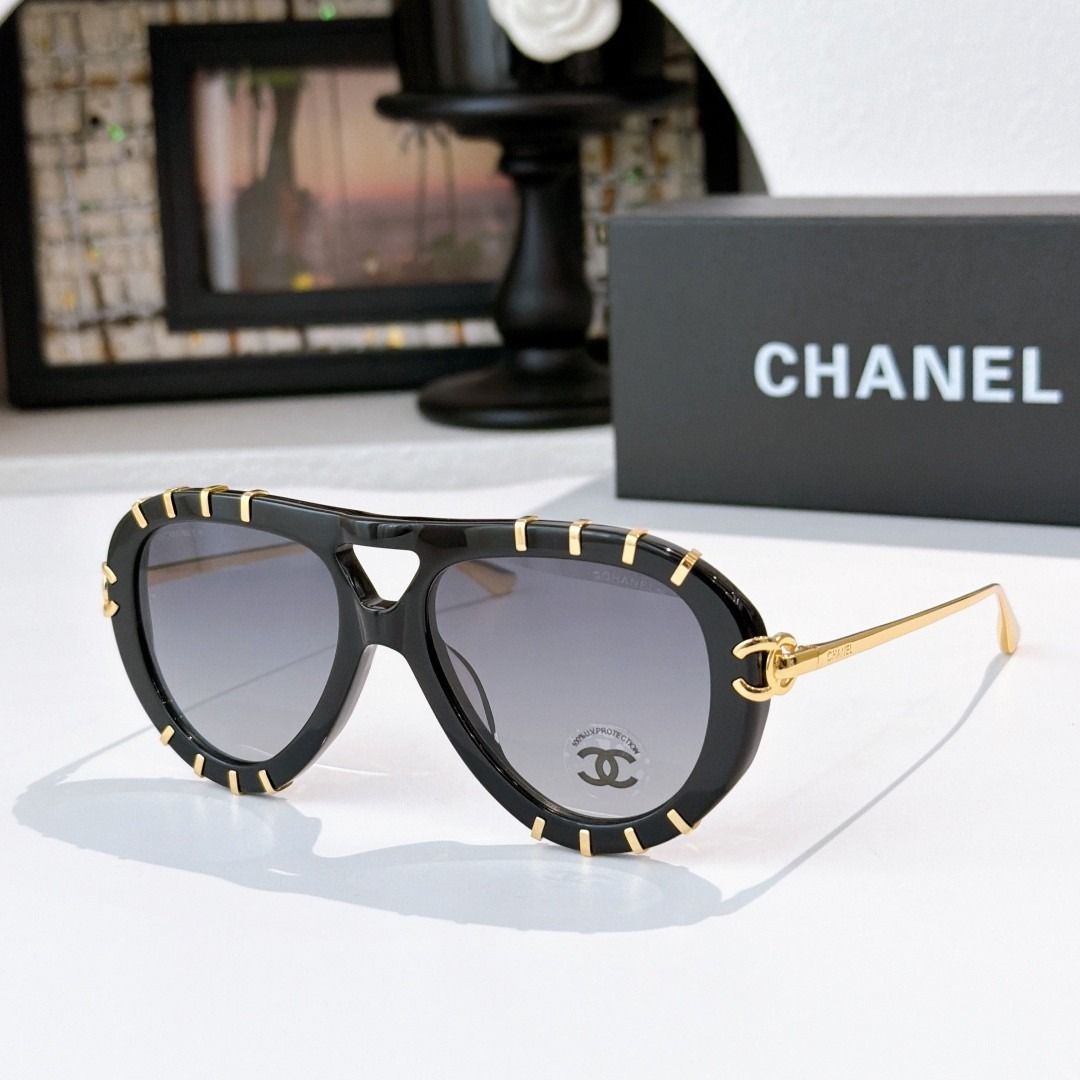 Chanel Aviator Sunglasses with Box (Category: Sunglasses & Eyewear) located in Paranaque City. Submitted by nurishadyl22738 (Listing ID 1466645485, Image 3). Description: - Brand: Chanel - Style: Classic aviator / pilot shape - Details: Metal accents around frames, signature CC logo on temples - Lenses: Tinted for sun protection - Inclusions: Branded black storage box - Condition: Great statement eyewear for daily outfits and sunny days.