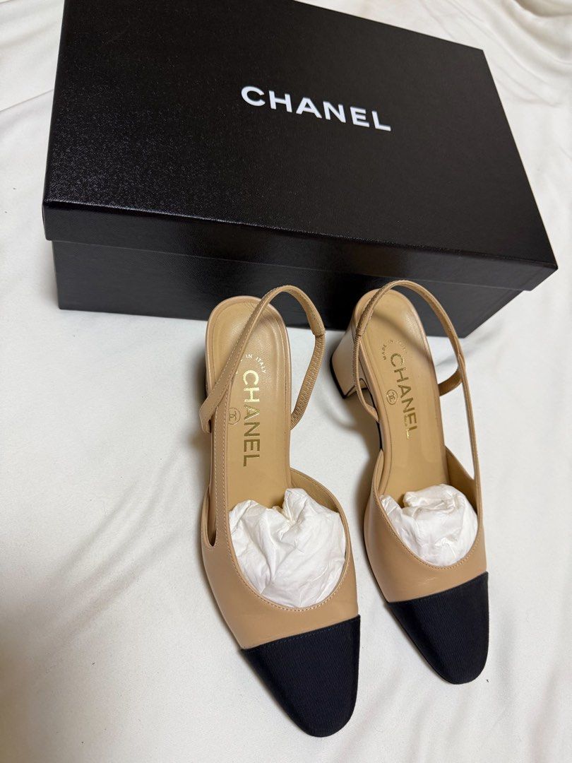 Chanel Beige and Black Slingback Heels (Category: Heels) located in San Juan City. Submitted by krishvee (Listing ID 1466732021, Image 1). Description: CHANEL Slingback Heels | Size 36.5 Calfskin & Grosgrain Color: Beige & Black Condition: Excellent, lightly used Inclusions: Dustbag & Box Original Price: ₱85,000 Selling Price: ₱34,500 Price is negotiable. DM for actual photos and details..
