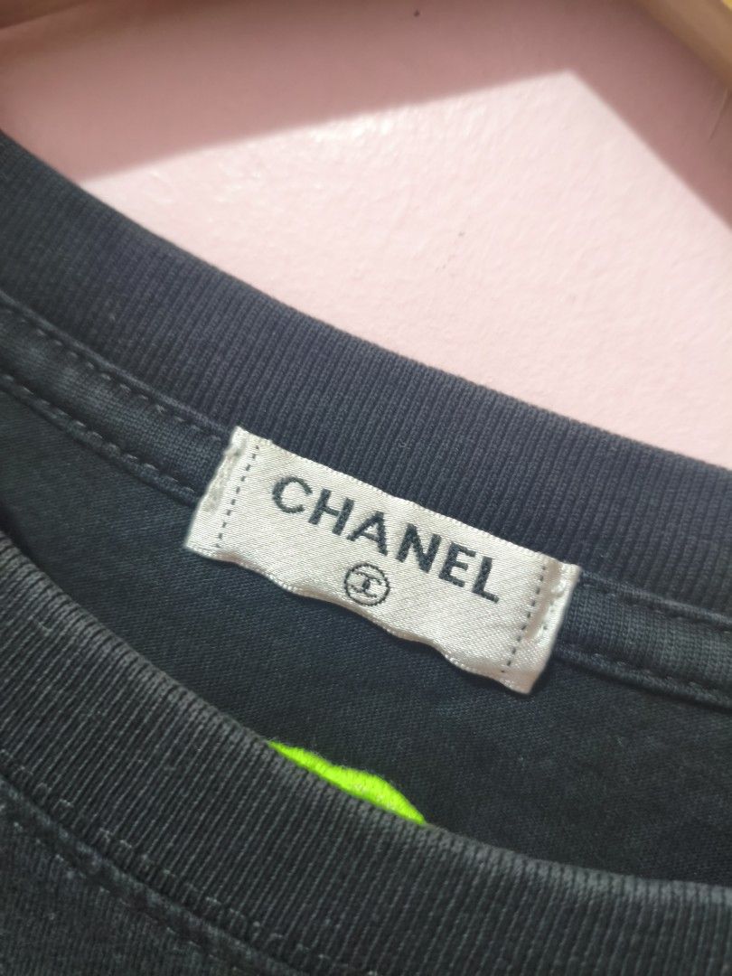 CHANEL Black Neon Green Logo Tee (Category: Shirts) located in Paranaque City. Submitted by glendel_04 (Listing ID 1466573367, Image 3). Description: Good cond 9.8/10 Size Med - Large Laundry ✅.