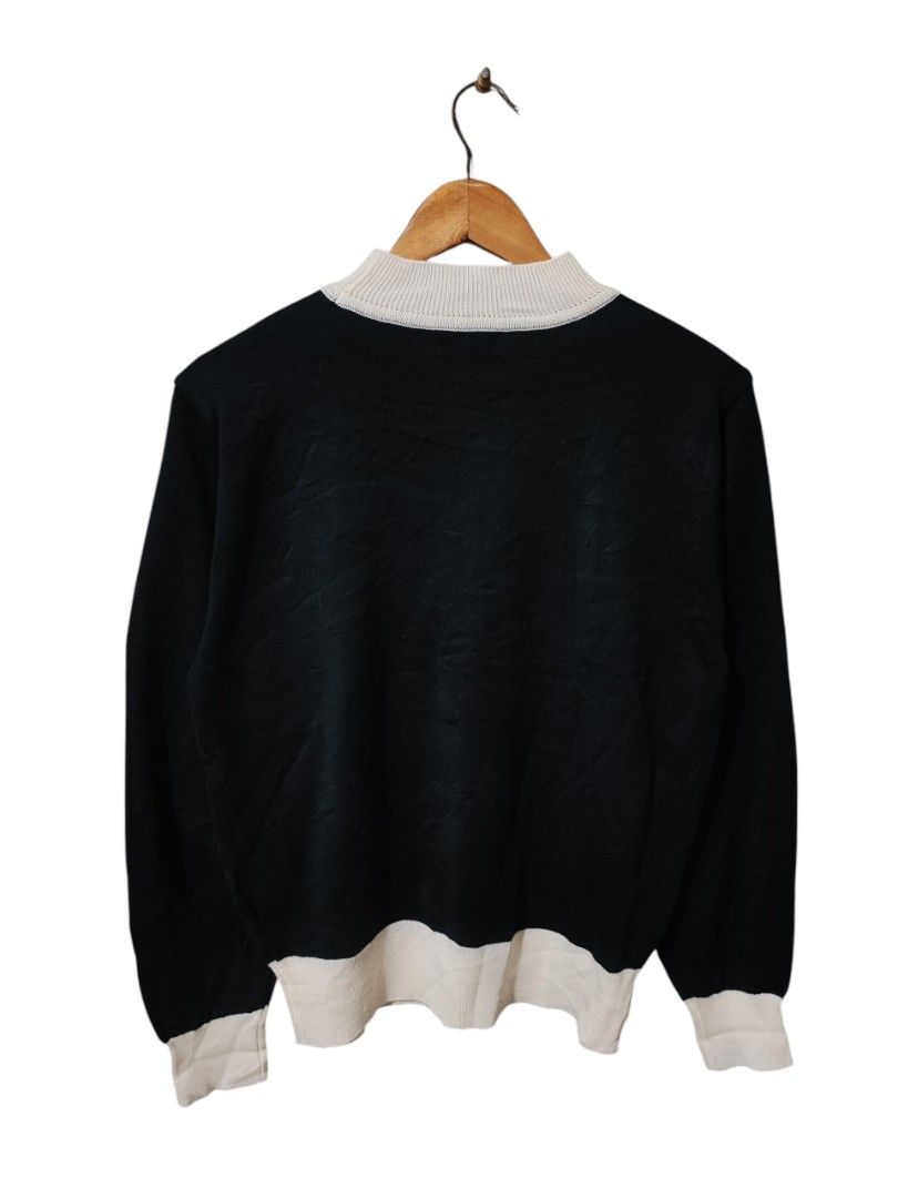 CHANEL CREWNECK KNIT SWEATER (Category: Others Tops) located in Iloilo. Submitted by gooddimes (Listing ID 1466688136, Image 2). Description: Chanel Crewneck Knit Sweater All-Over CC Logos Size on tag: Dimes: 19Wx23.5L Issue/s: None Color rate: 10/10 Like new condition ₱1,200 Reminders: - All items are thrifted, please manage your expectations - Color may vary due to lighting - Please wash before using the item - Due to different personal measure