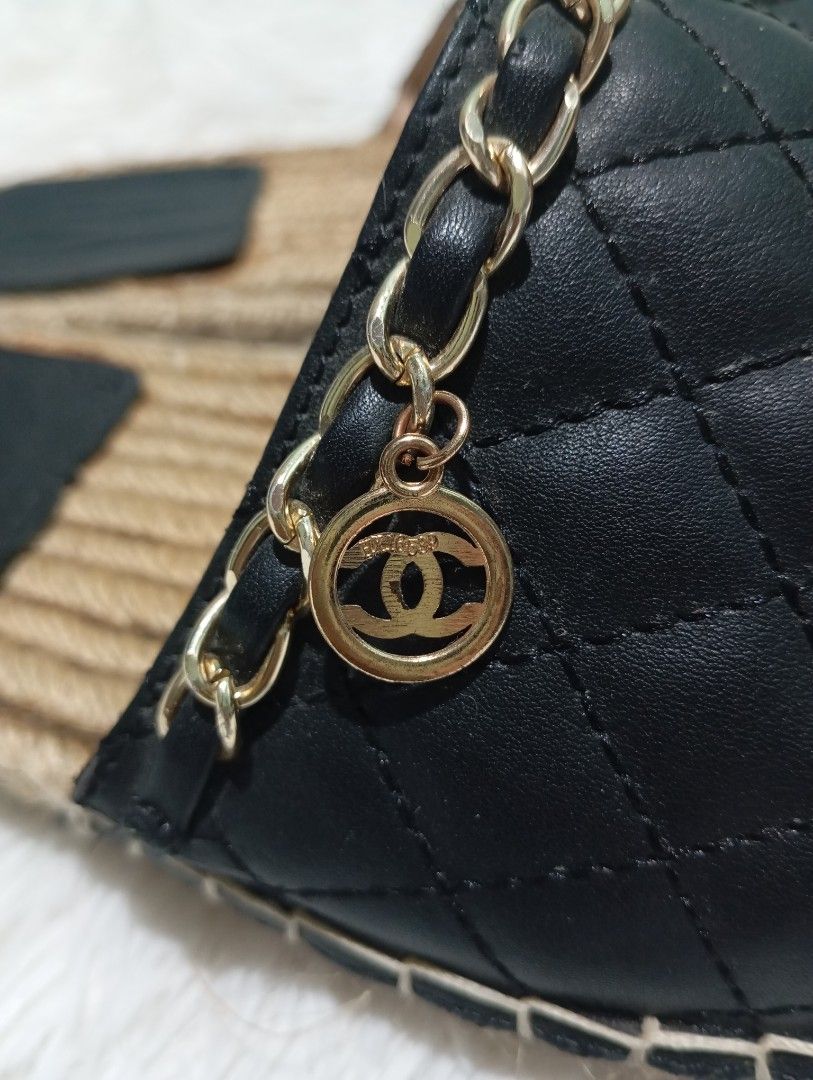 Chanel Quilted CC Chain Espadrille Mule / Slide (Category: Sneakers & Footwear) located in Quezon City. Submitted by thesecondmarketph (Listing ID 1466757330, Image 3). Description: - Style: Slip-on slide sandals - Color/Design: Black quilted upper with espadrille jute rope trim - Details: Woven gold chain accent featuring a hanging round interlocking CC logo charm - Soles: Flat with black inner footbeds - Condition: Worn a few times, with minor 
