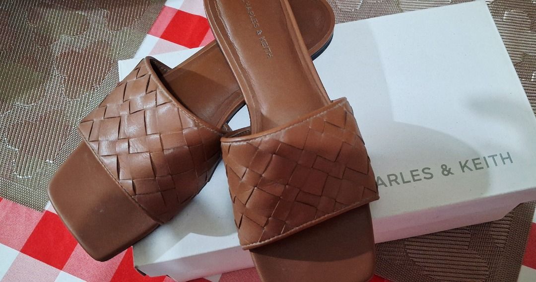 Charles & Keith Braided Square Toe Slides Tan Size 38 (Category: Flats & Sandals) located in Manila. Submitted by katkween23 (Listing ID 1466771891, Image 3). Description: - Brand: Charles & Keith - Style: Slip-on flat sandals with trendy square toe - Detail: Chic woven braided top strap - Size: EU 38 - Condition: Excellent, clean insoles with very minimal wear on soles - Inclusion: Original white branded box included.