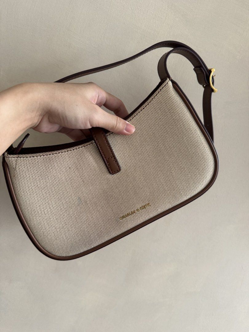 Charles & Keith Shoulder Bag (Category: Shoulder Bags) located in Santa Rosa. Submitted by shopjimstuff (Listing ID 1466576475, Image 3). Description: Shoulder bag (kili kili bag) Body is canvas With dust bag With minimal signs of usage No damages - 9/10 condition Personal fave! Will keep if no one’s interested! Bought for P3,800 .