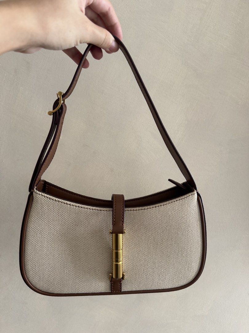Charles & Keith Shoulder Bag (Category: Shoulder Bags) located in Santa Rosa. Submitted by shopjimstuff (Listing ID 1466576475, Image 1). Description: Shoulder bag (kili kili bag) Body is canvas With dust bag With minimal signs of usage No damages - 9/10 condition Personal fave! Will keep if no one’s interested! Bought for P3,800 .
